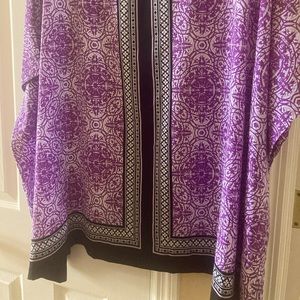 Tunic style roomy top.Great for summer w slacks or bathsuit coverup. New wo tags